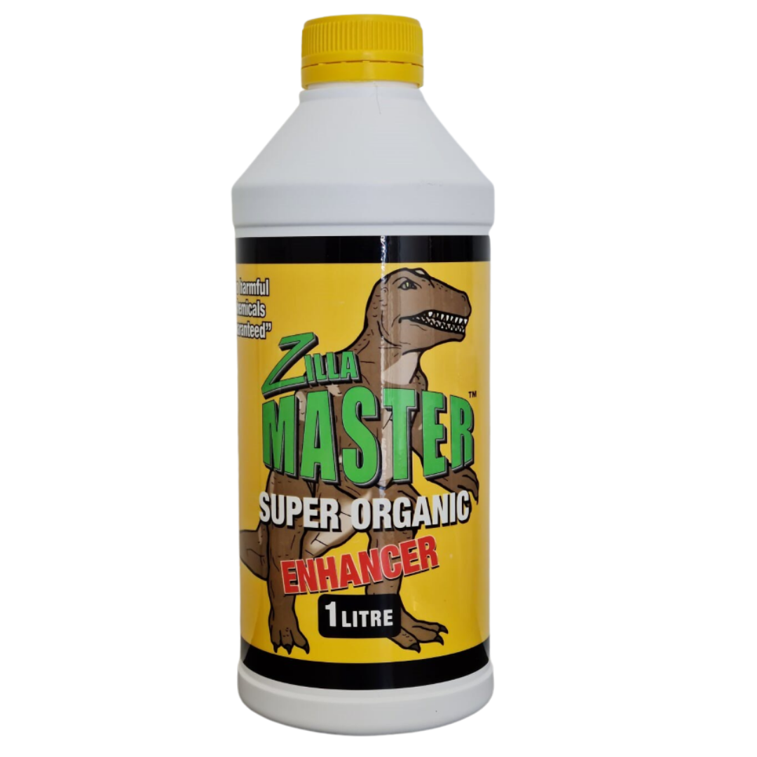 A bottle of Zillamaster Super Organic Enhancer, with a dinosaur graphic on the label, indicating it is a 1 litre product.